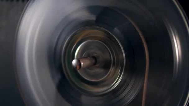 Bobbin with tape is spinning very fast — Stock Video