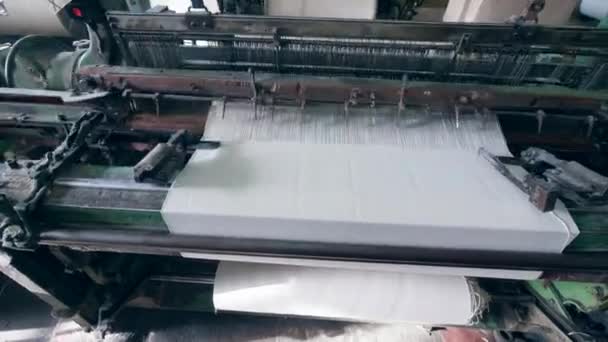 Threads are getting mechanically sewn into fabric — Stock Video