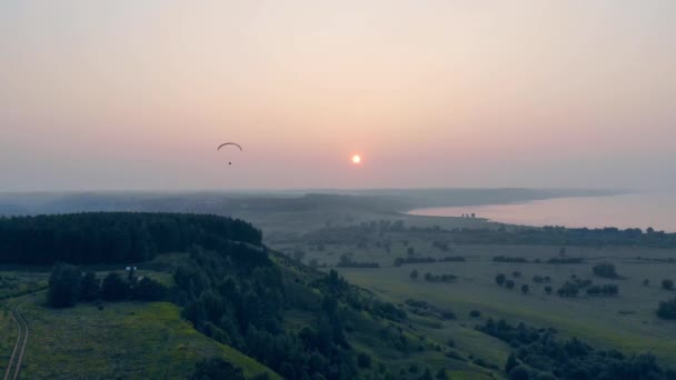 Person training with a glider high in sky. Adventure, active extreme lifestyle concept. — 비디오