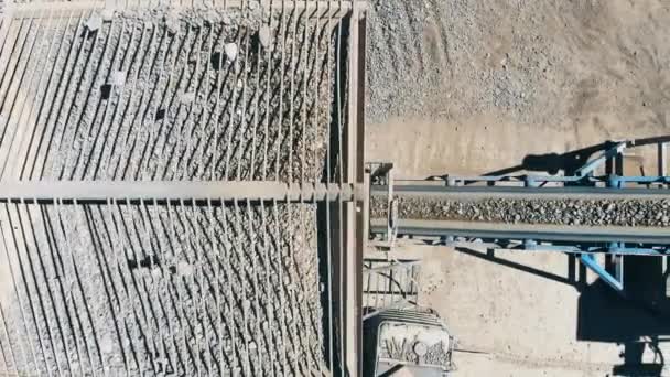 Heavy industry mining equipment. Rubble on a crushing machine at a quarry. — Stock Video