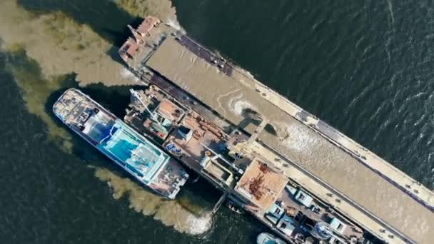 Sand extraction site with working machines. — Stock Video