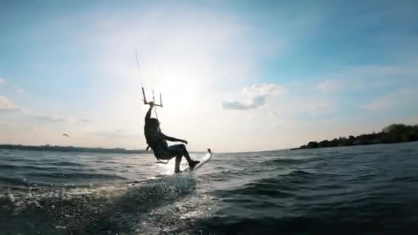 Man rides a kiteboard on water. Kiteserfer fails. — Stock Video