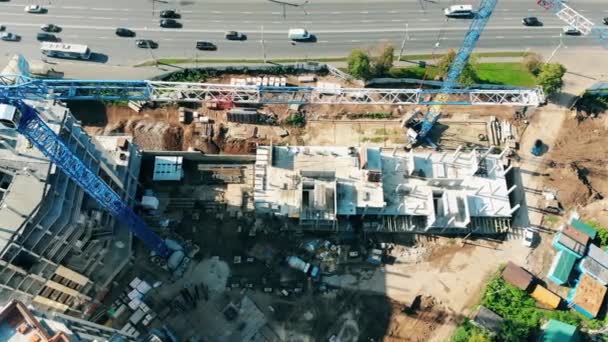 Top view of the building site with machinery and houses — Stock Video
