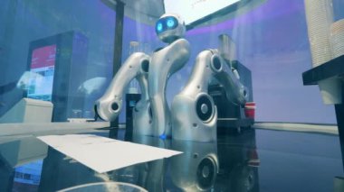 Robot kahve yapıyor ve servis yapıyor.