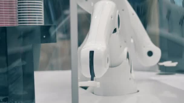 Mechanical arm of a cybernetic barista in motion — Stock Video