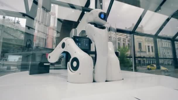 Futuristic coffee bot at work in a robot cafe. Robot, innovation, ai concept. — Stock Video