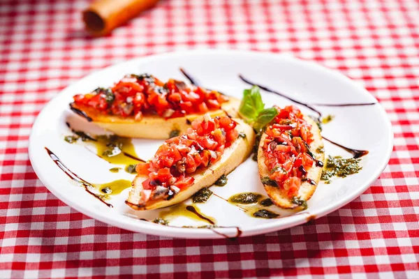 Traditional Italian Bruschetta Cherry Tomatoes Pesto Sauce Balsamic Vinegar White — Stock Photo, Image