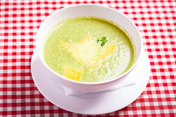 Broccoli cream soup with cheese in white bowl. Close up — Stock Image Broccoli Cream Soup Cheese White Bowl Close Royalty Free Stock Photos