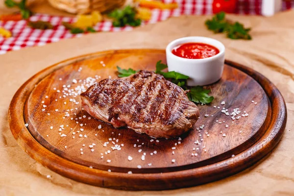 Grilled Beef Steak Tomato Sauce Wooden Cutting Board Close — Stock Photo, Image