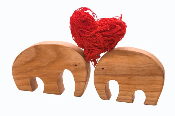 Слоновьи Фигурки Поддерживают Вместе Красное Декоративное Сердце — стоковое фото