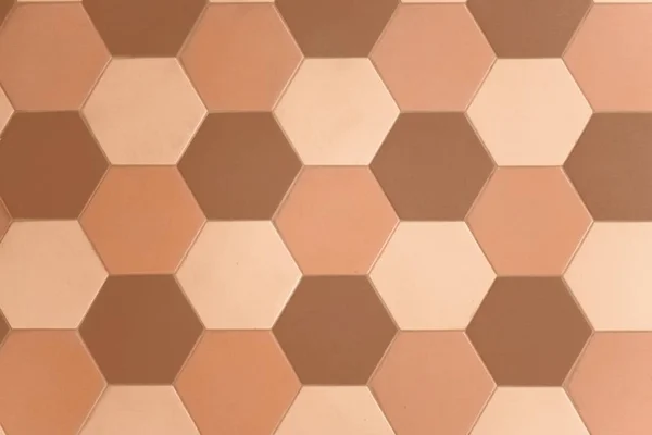 Altıgen fayans duvar veya zemin sıcak renk düzeni üzerinde. Modern, şık fayans kez içinde modern iç mekanlar kullanılır