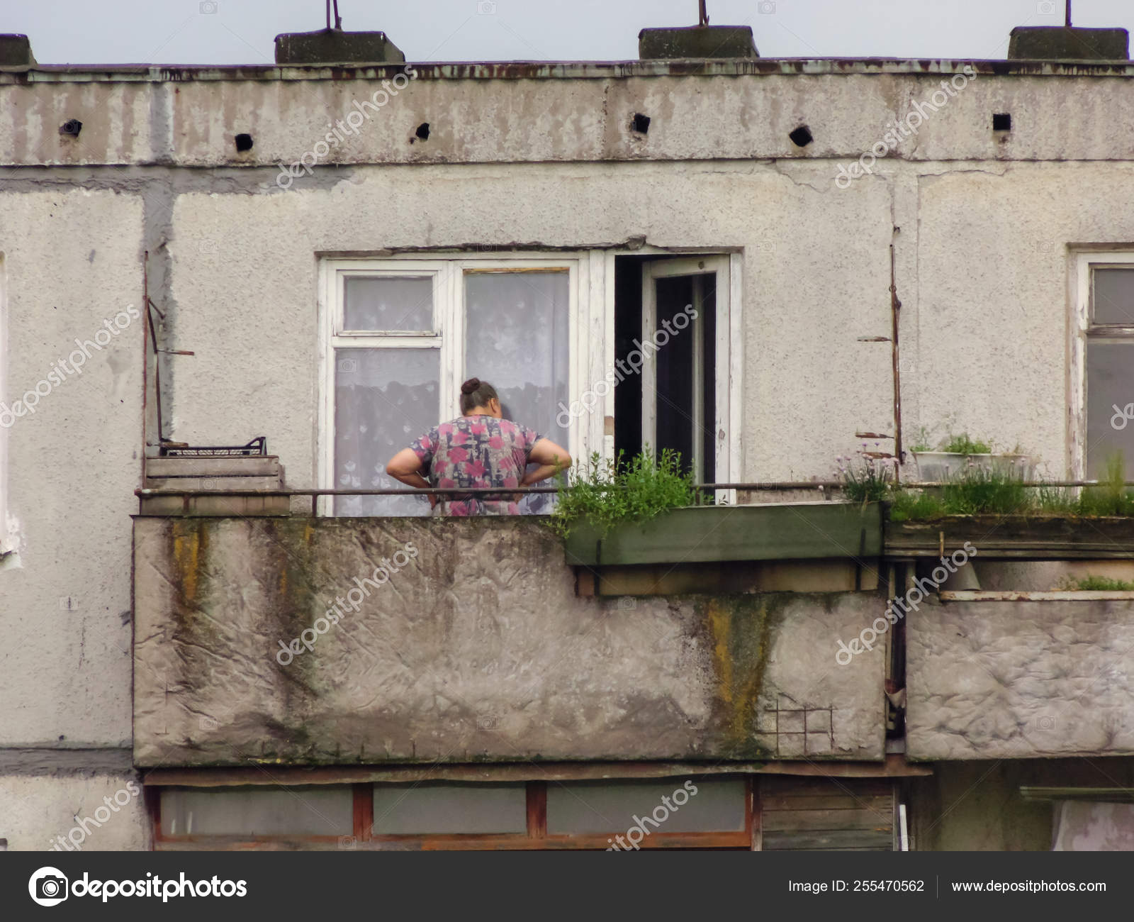 chubby wife on balcony