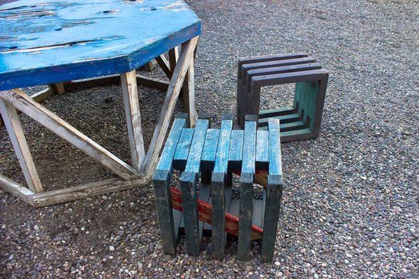 Outdoor furniture knocked out of the boards.