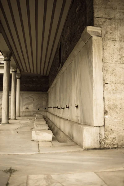 Ablution taps at a mosque in Istanbul where worshippers wash their feet. Aya Sofia Istanbul.