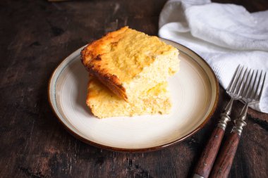 cottage cheese casserole piece on a plate/