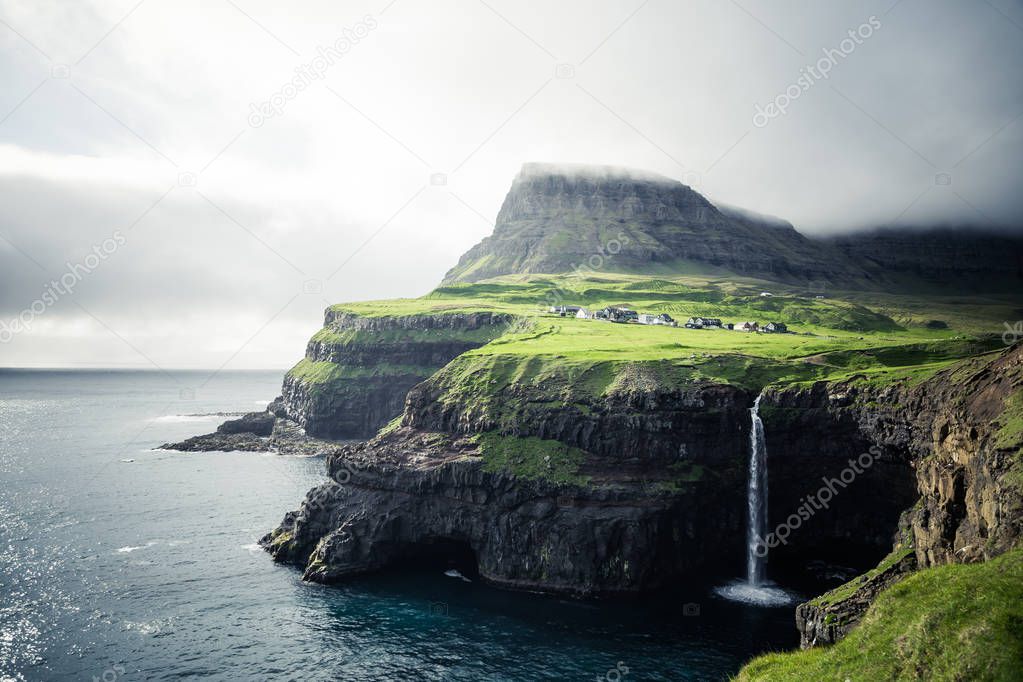 Gasadalur village and Beautiful waterfall. Vagar, Faroe Islands,