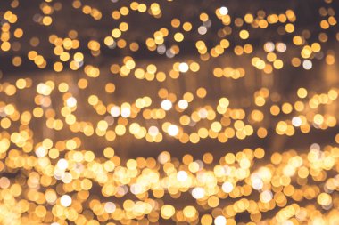 Altın soyut bokeh arka plan. Noel altın arka planı. Golde