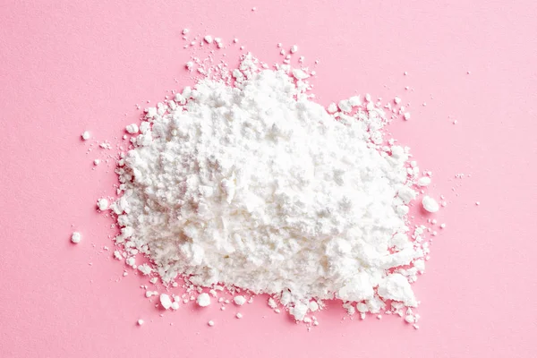 Toz şeker pembe arka plan, üstten görünüm üzerinde yığını