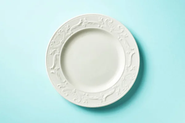 White Plate Blue Background Top View — Stock Photo, Image