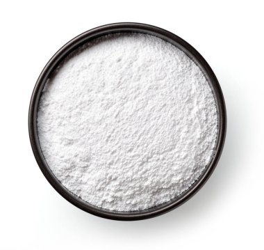 Bir kase kabartma tozu beyaza boyanmış, yukarıdan.