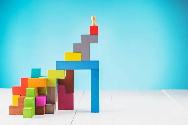 Success building concept. Personal development, personal and career growth, progress and potential. People standing on wood block as step stair. Success business management, growth business concept.