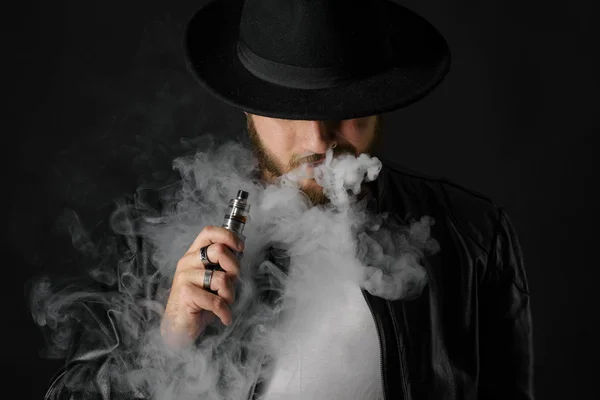 Man Vaping Mod Exhaling Steam Black Studio Background Bearded Guy — Stock Photo, Image