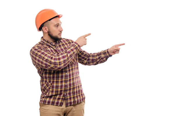 Trabalhador Construtor Construção Protetora Mãos Capacete Laranja Apontando Para Direita — Fotografia de Stock