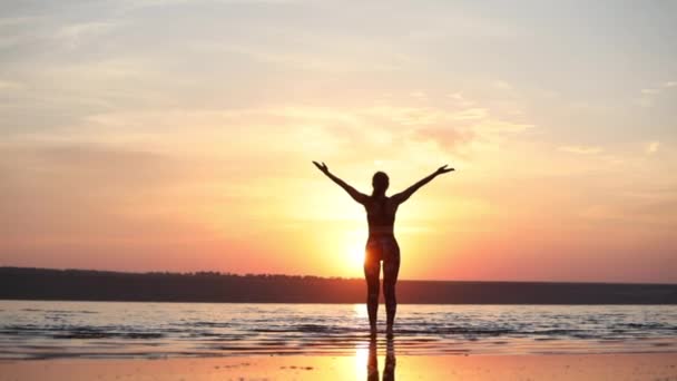 Slim Woman Practices Yoga Breathing Techniques Raises Hands Sunset Sky — Stock Video