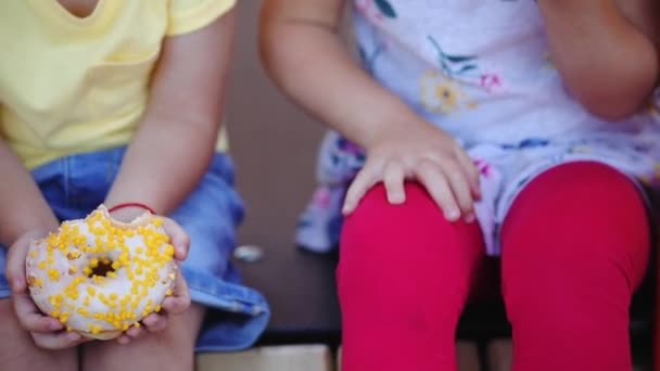 Footage Kids Eating Sweet Glazed Donuts — Stock Video