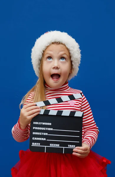 Petite Fille Souriante Chapeau Père Noël Avec Clapet Sur Fond — Photo