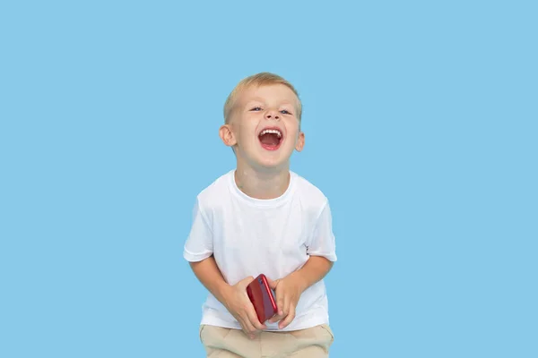 Cute Smilling Child Boy Smartphone Blue Background Advertising Educational Applications — Stock Photo, Image