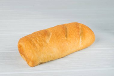 Ev yapımı ekmek - ciabatta hafif bir arka plan üzerinde.