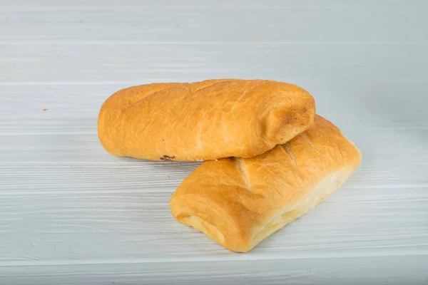 Pâine de casă - ciabatta pe un fundal deschis . — Fotografie, imagine de stoc