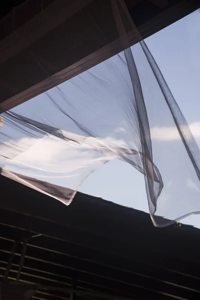 Curtain moved by the wind