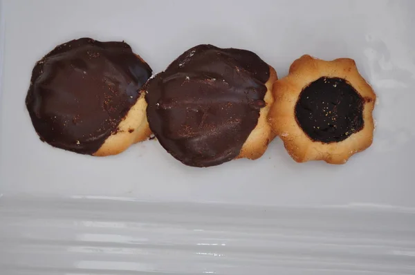 tea pastes with filling, sugar and chocolate