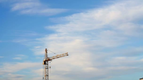 Construction crane on background blue sky. Closeup — Stock Video