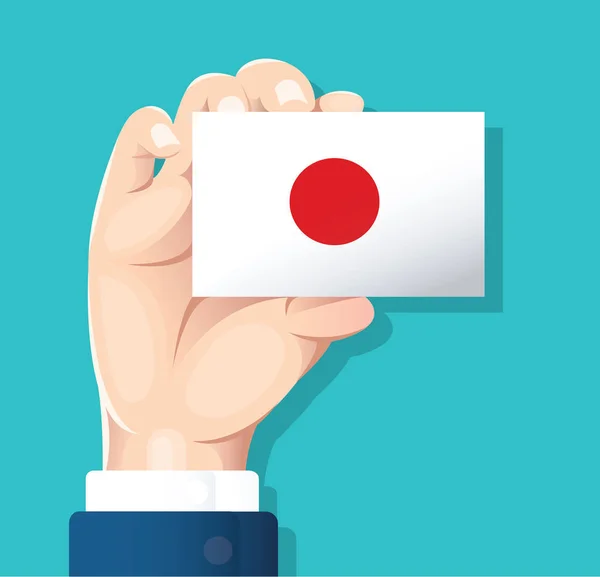 Main Tenant Carte Drapeau Japon Avec Fond Bleu Illustration Vectorielle — Image vectorielle