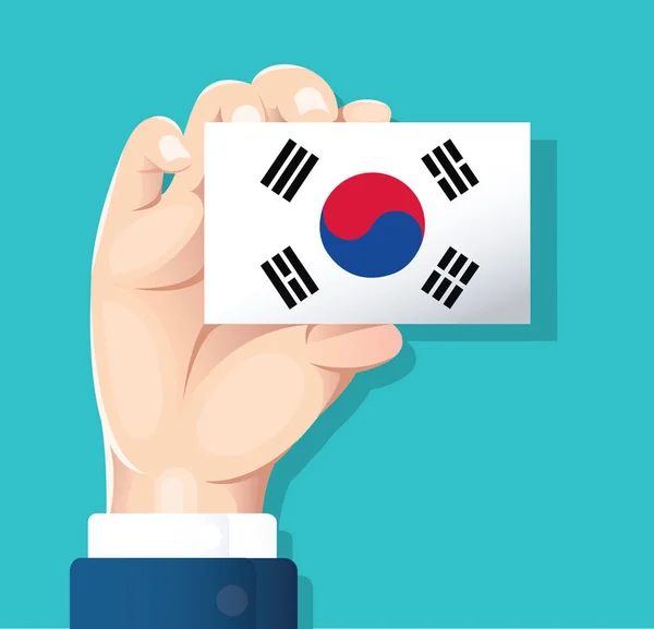 Main Tenant Carte Drapeau Corée Sud Avec Fond Bleu Illustration — Image vectorielle