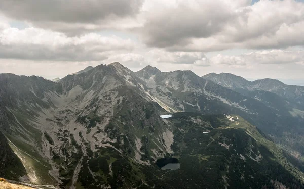 many peaks of Western Tatras mountains with thrre lakes bellow from Volovec mountain peak on slovakian - polish borders