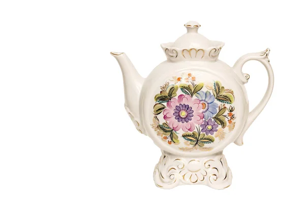 Beyaz arka plan üzerinde duran çiçek baskı ile güzel antika beyaz çaydanlık