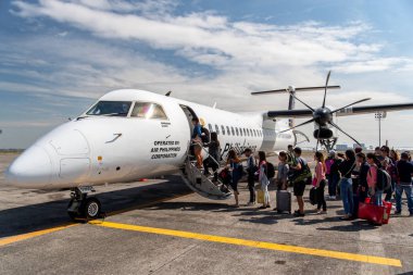 Aralık 21,2018 yolcu uçağa havaalanında Clark, Clark, Filipinler yatılı