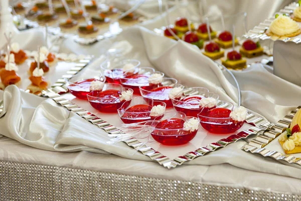 Raspberry Jelly Dessert on a festive table — Stock Photo, Image