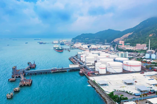 Aerial view of oil storage tank and pipeline steel and oil tanker