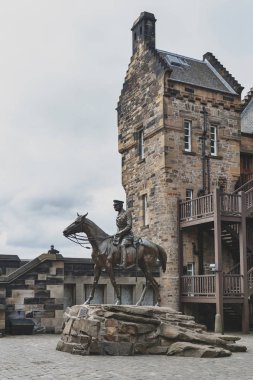 Edinburgh, Scotland - April 2018: The imposing equestrian statue of Field Marshal Earl Haig situated outside the National War Museum at Hospital Square in Edinburgh Castle, Scotland clipart