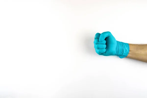 Male hand in medical glove on white background. — Stock Photo, Image