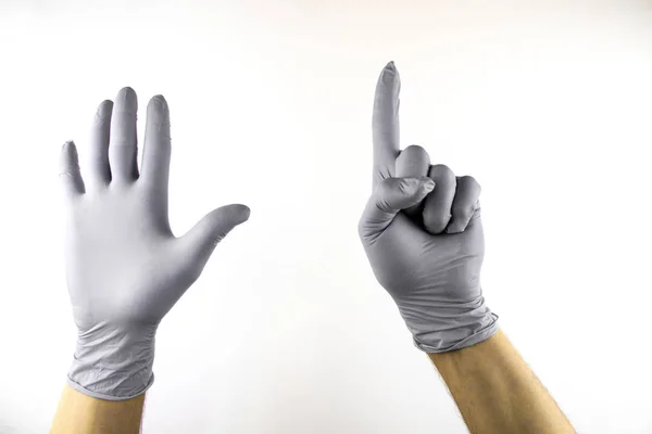 Mano masculina en guante médico sobre fondo blanco . — Foto de Stock