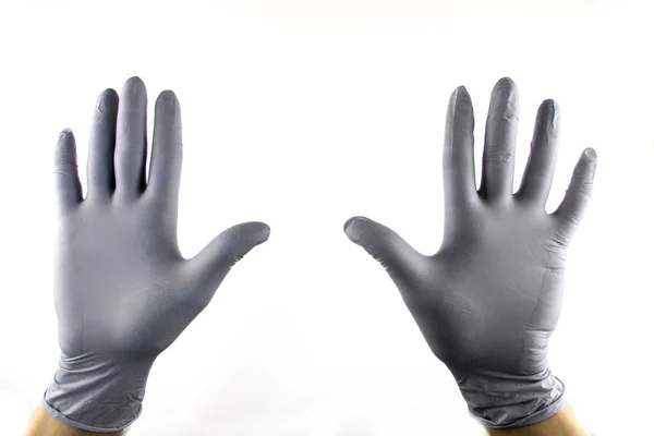 Mężczyzna ręka w rękawiczce medycznej na białym tle. — Zdjęcie stockowe