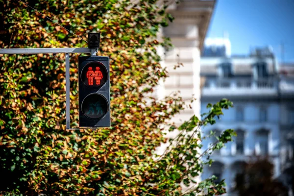 Romantic traffic light prohibiting the passage of the street. Vienna. Austria