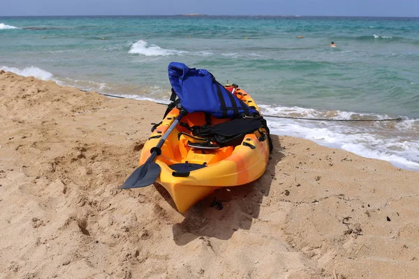 sports kayak on the shores of the Mediterranean Sea in the north of Israel
