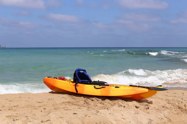 sports kayak on the shores of the Mediterranean Sea in the north of Israel